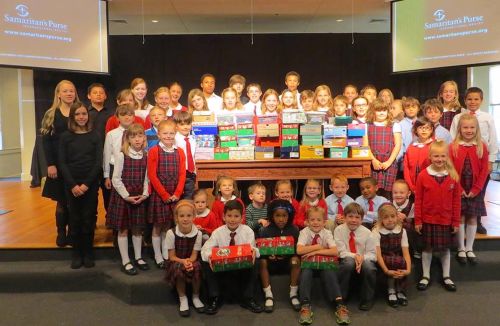 Lighthouse Christian Academy packs boxes for Operation Christmas Child